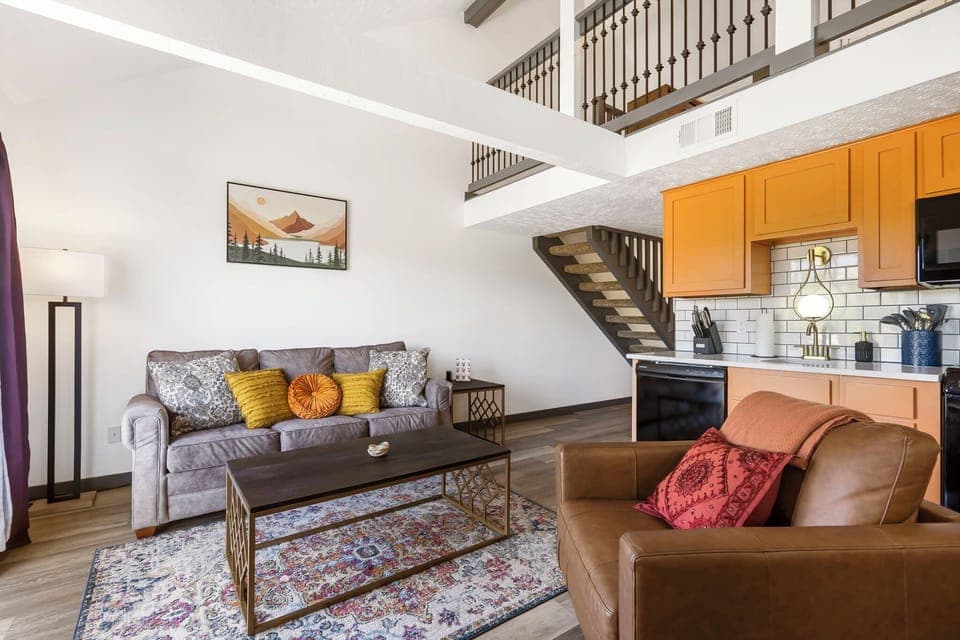 Living, dining, and kitchen area