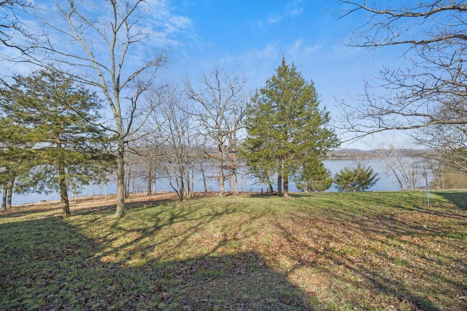 Beautiful lake view from back deck with outdoor seating