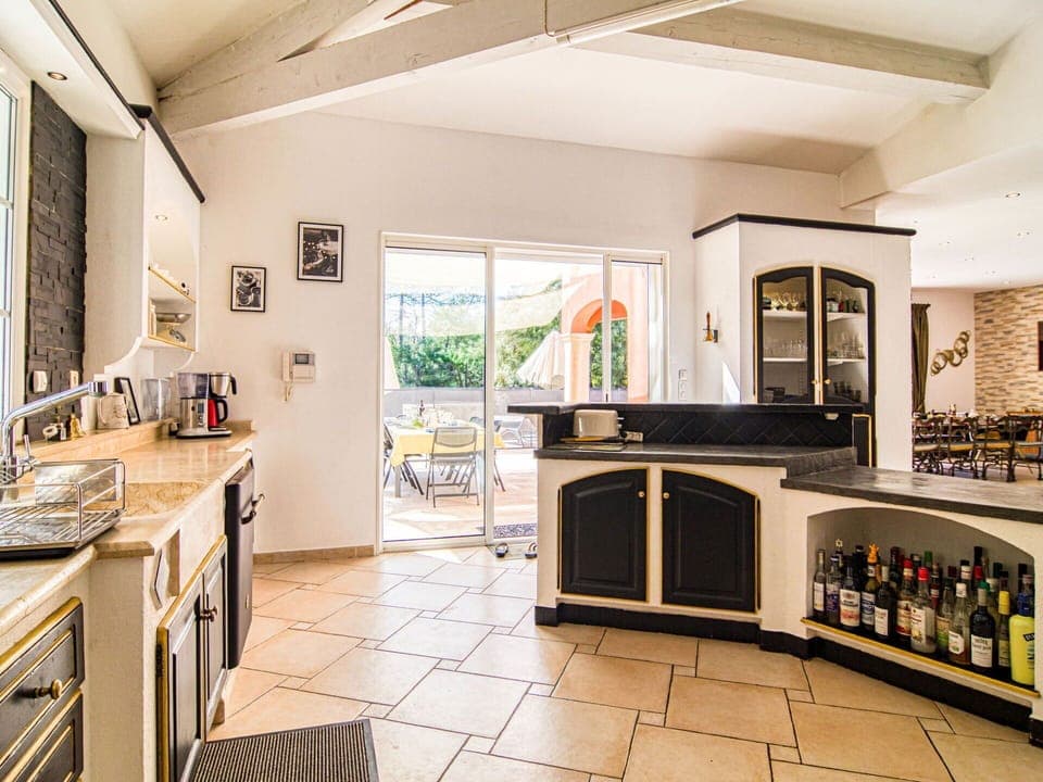 Cabinetry, Countertop, Property, Kitchen, Kitchen Stove, Kitchen Appliance, Home Appliance, Lighting, Wood, Architecture