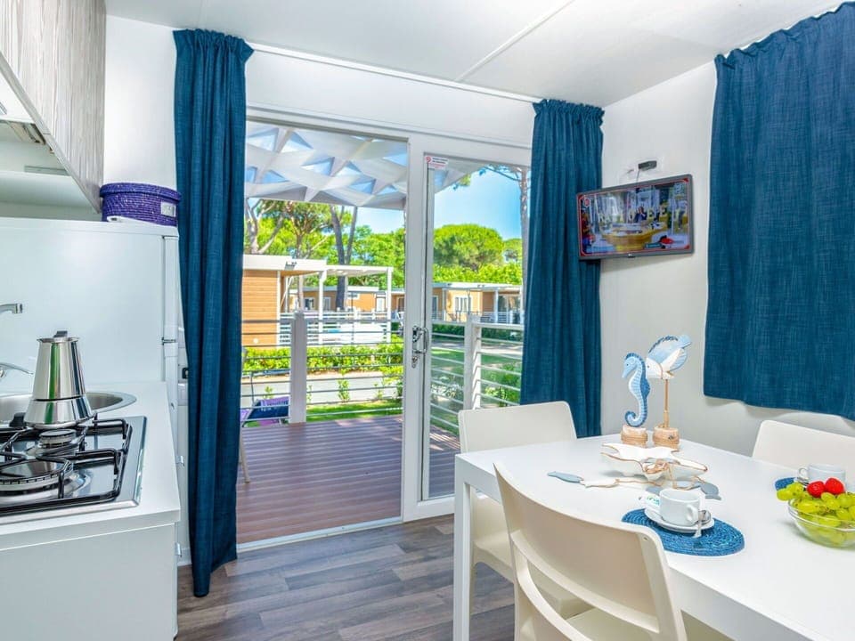 Furniture, Table, Blue, Green, Azure, Tableware, Interior Design, Curtain, Floor, Building