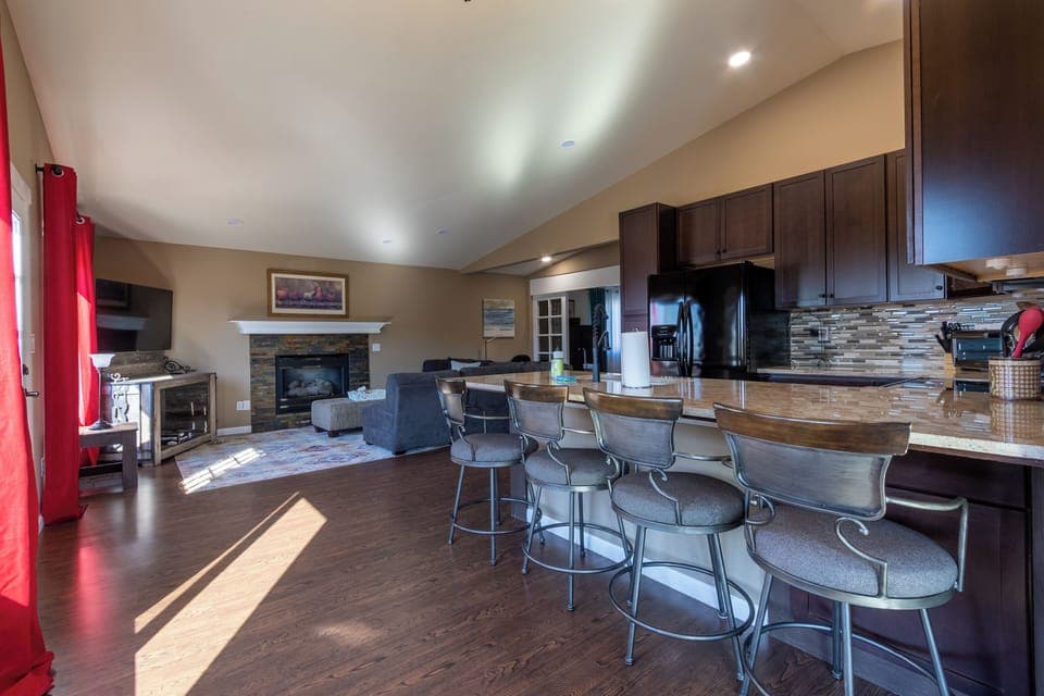 Full kitchen with another living room area