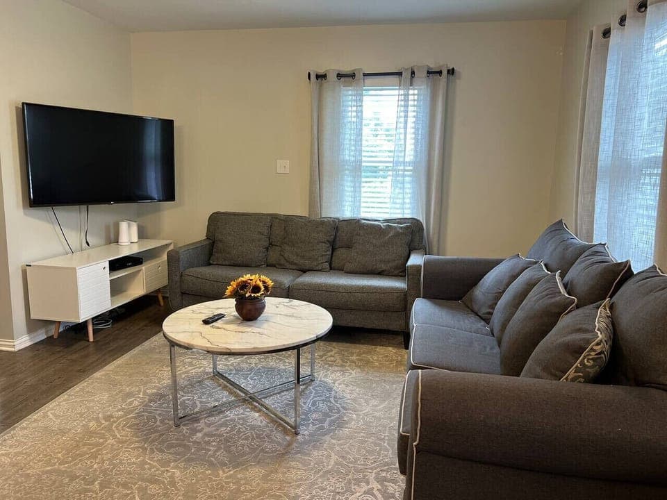 Living room with Smart TV and pull out sofa
