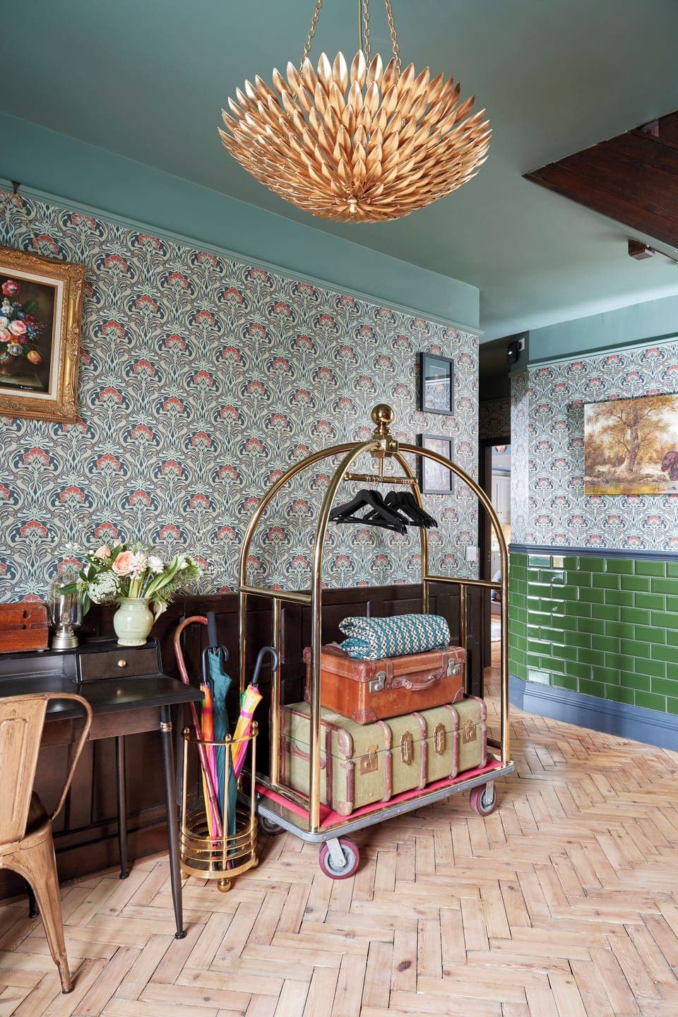 Hallway with original panelling and vintage lobby trolley 