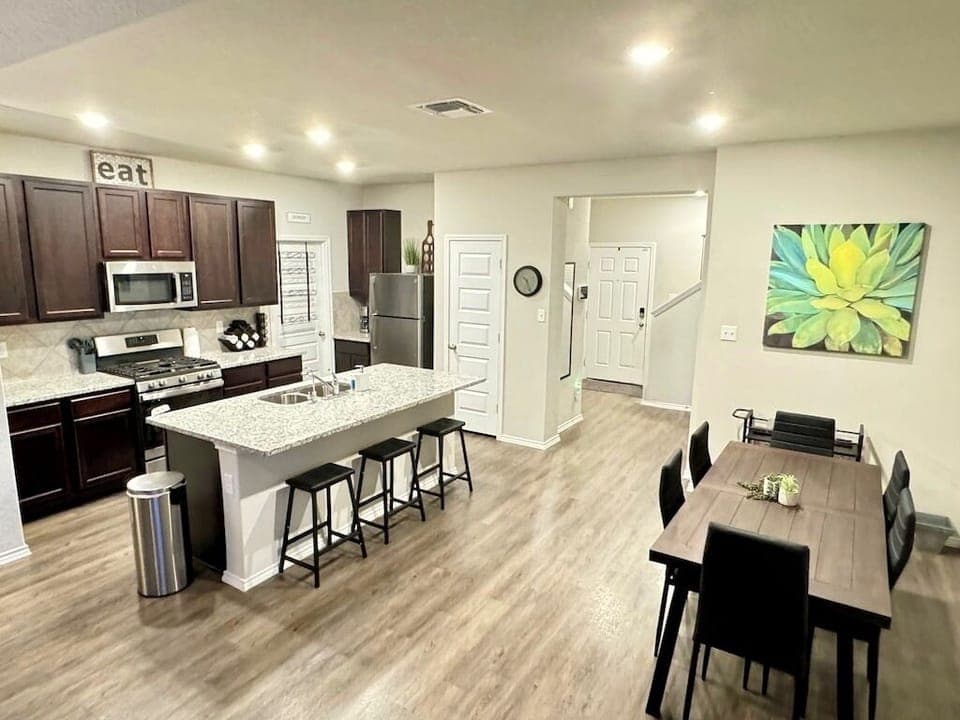 Enjoy our open floor plan! Kitchen and dining to host the whole family.