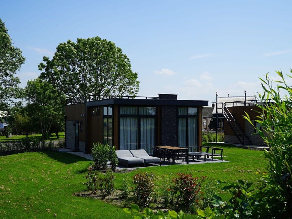 Plant, Sky, Building, Shade, Land Lot, Tree, Cloud, Cottage, Real Estate, Grass