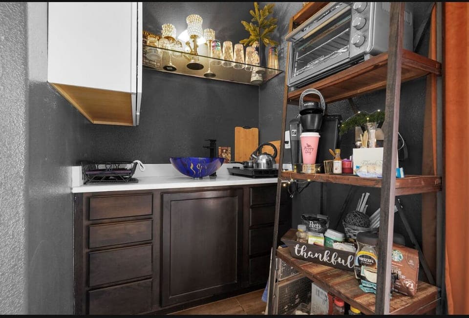 Kitchen w toaster oven, coffee, stove FULL SIZE REFRIGERATOR 