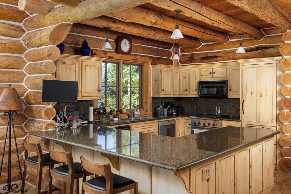 Spacious and modern fully stocked kitchen with top of the line appliances