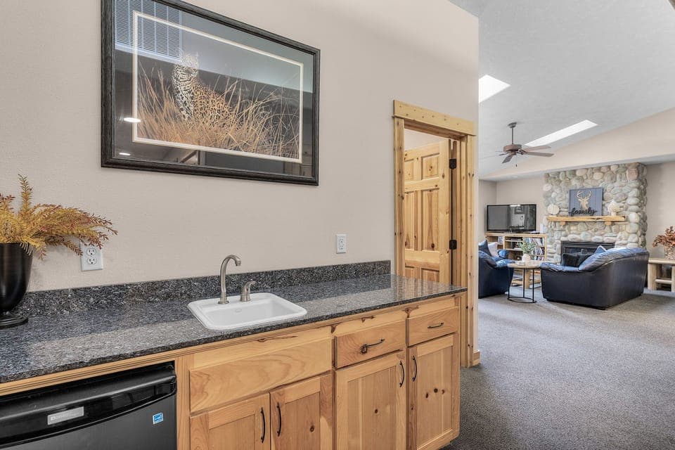 Downstairs Wet bar with mini fridge