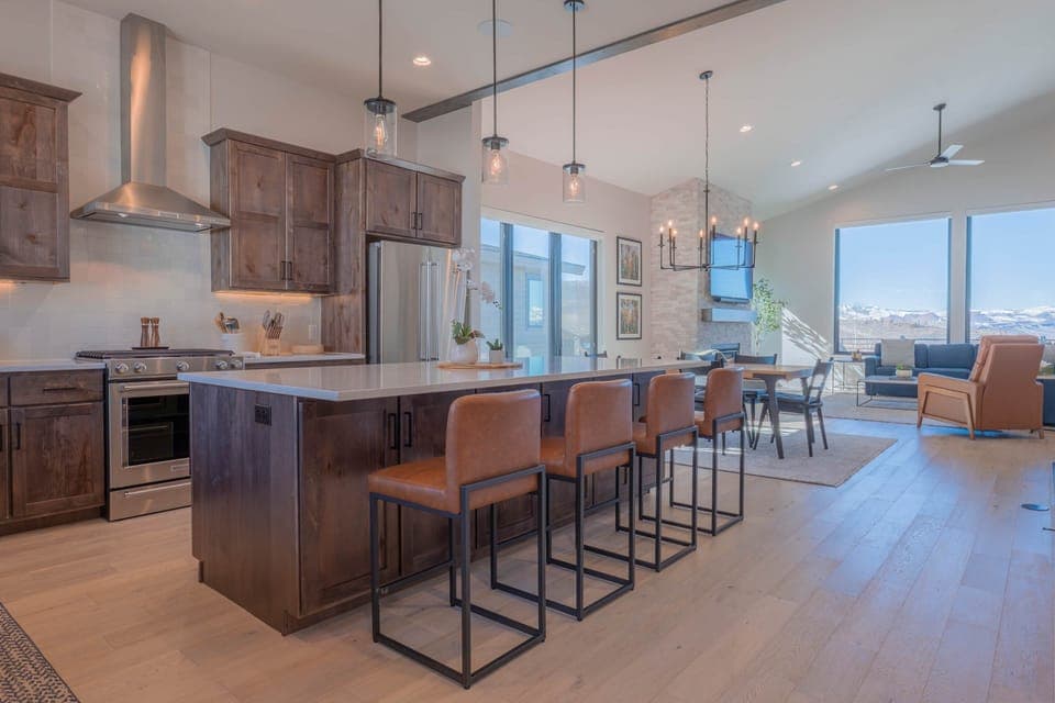 Bright and open living space with expansive windows showcasing stunning Rocky Mountain views.