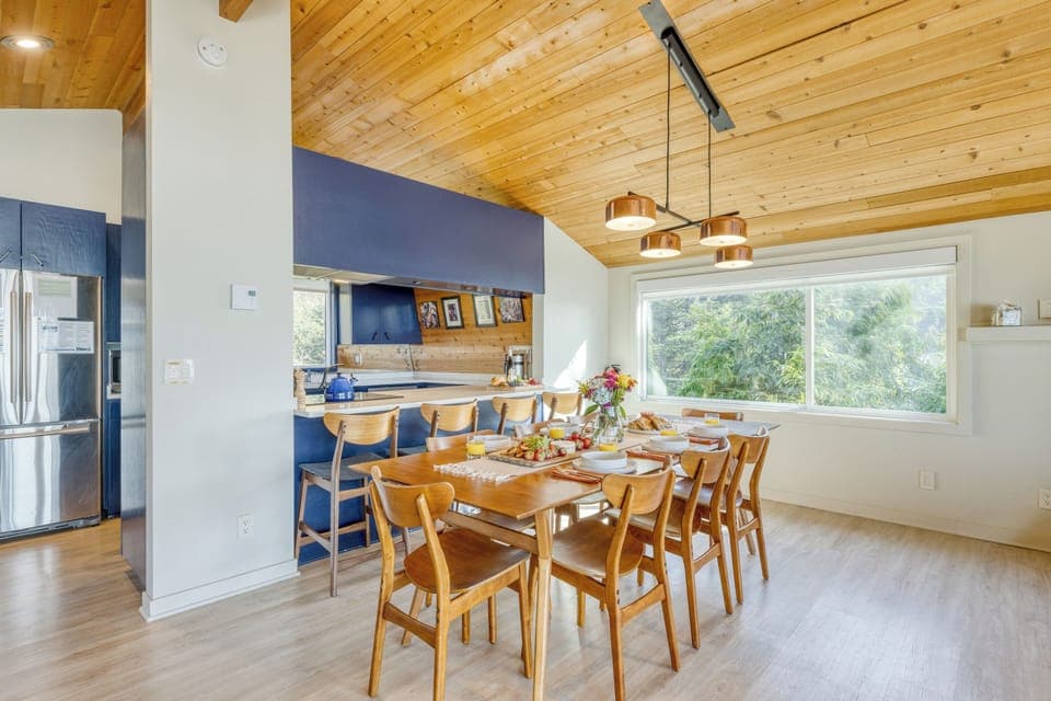 Spacious dining area and fully equipped kitchen.