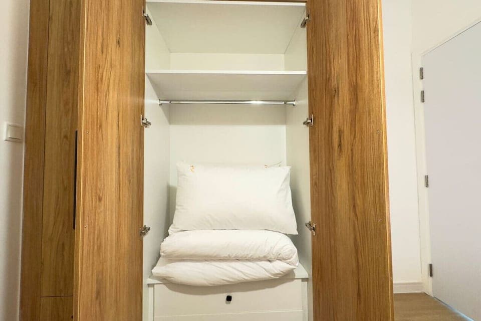 An elegant, spacious closet designed to keep your belongings organized and easily accessible.