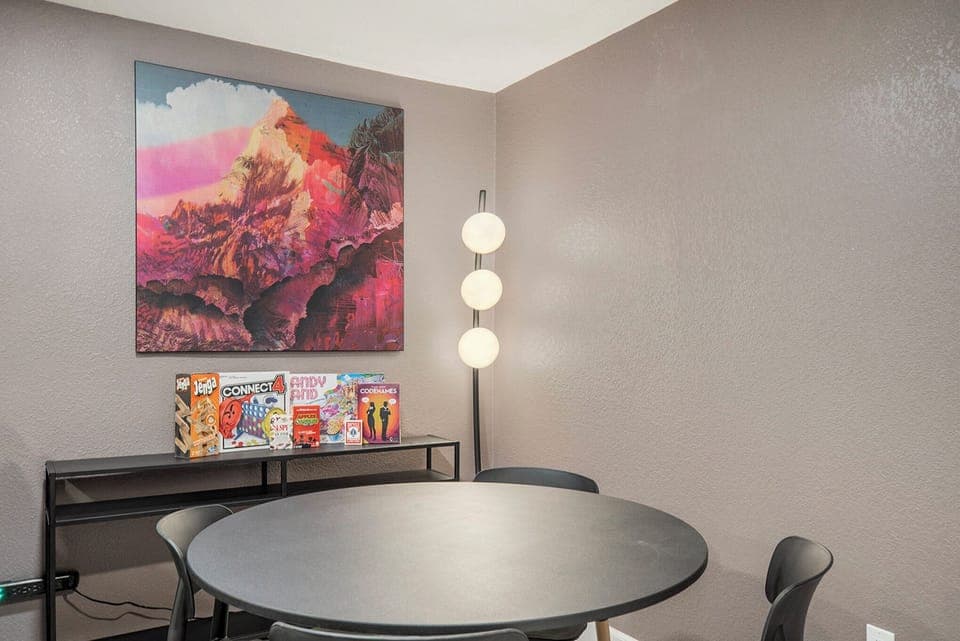 Enjoy a fun-filled game night at the game table, complete with a selection of provided board games for endless entertainment!