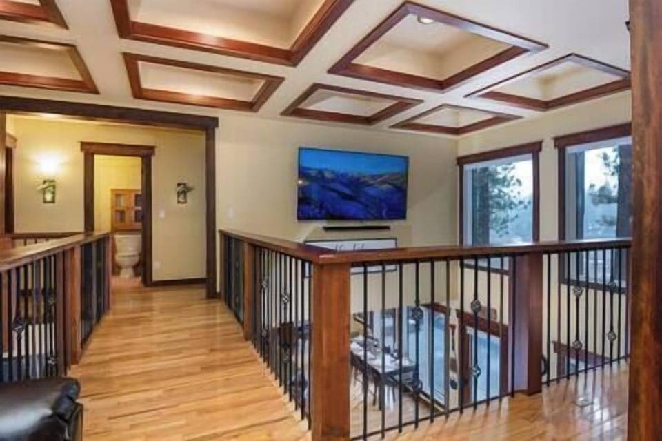 85 Inch Samsung QLED Wall Mounted TV/Soundbar next to the Pool Table