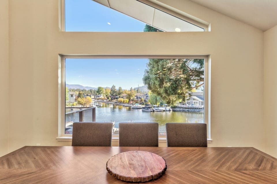 Gather around the table for unforgettable conversations in this stunning home