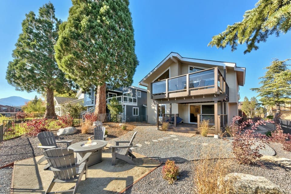 Enjoy the fully fenced backyard with a fire pit perfect for family gatherings