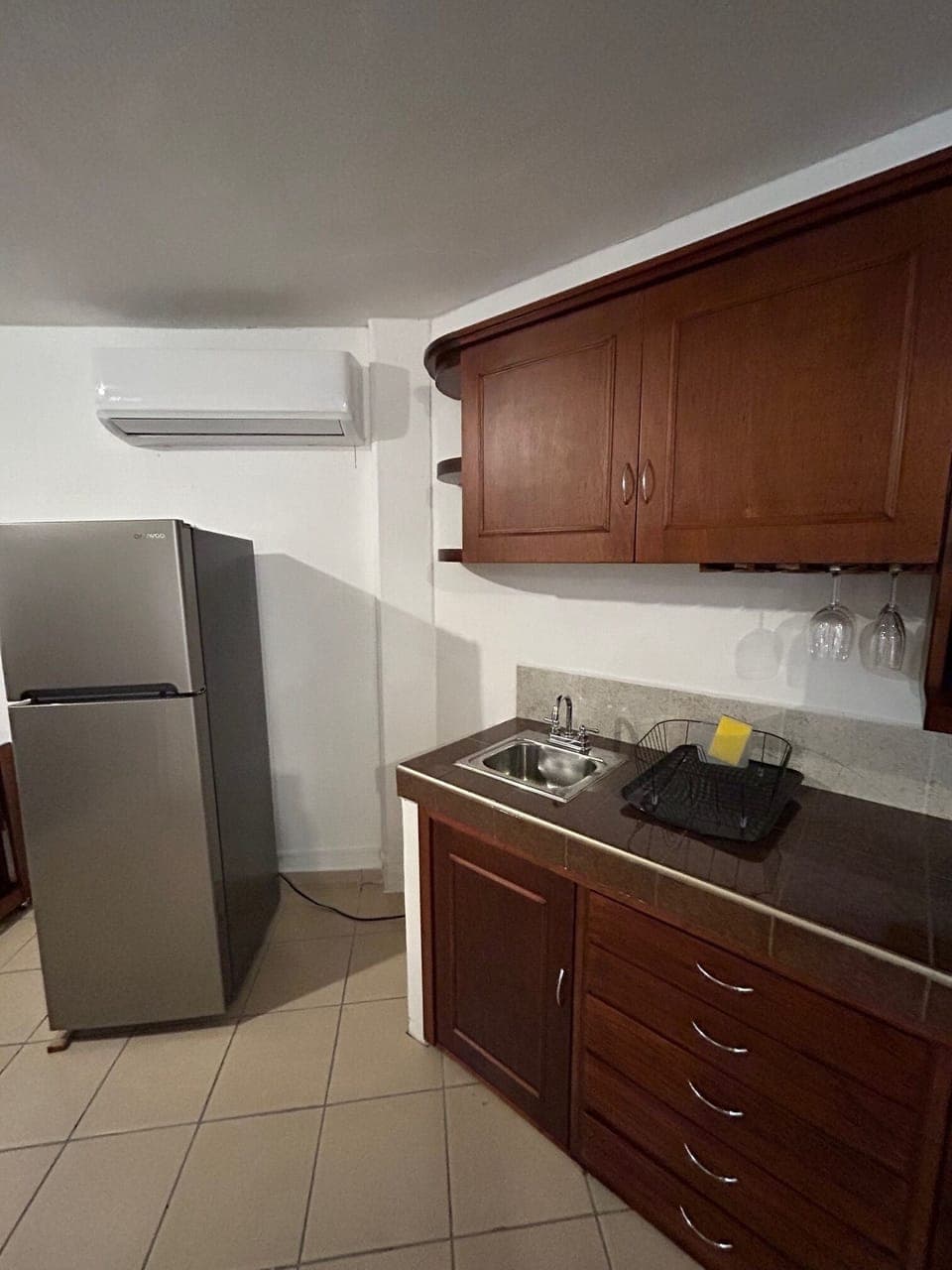 Fully stocked kitchen-- pots, pans, dishes, etc. Stove, oven and microwave. 