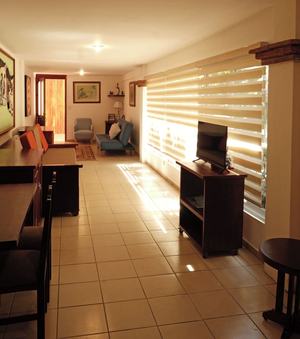 It has ample storage, a fold down sleeper sofa and pull out single bed. 