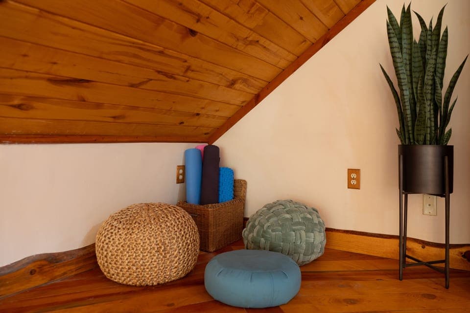 5 yoga mats are provided, as well as yoga blocks and a bolster.