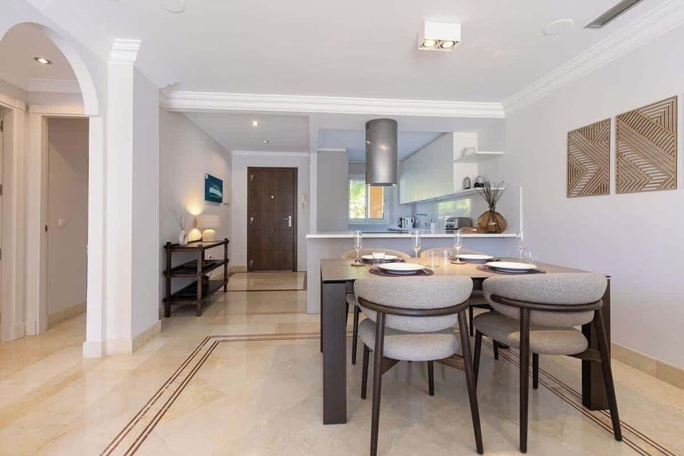 Elegant dining area with cozy seating, artistic decor, and a warm ambiance—perfect for gathering and making memories.







