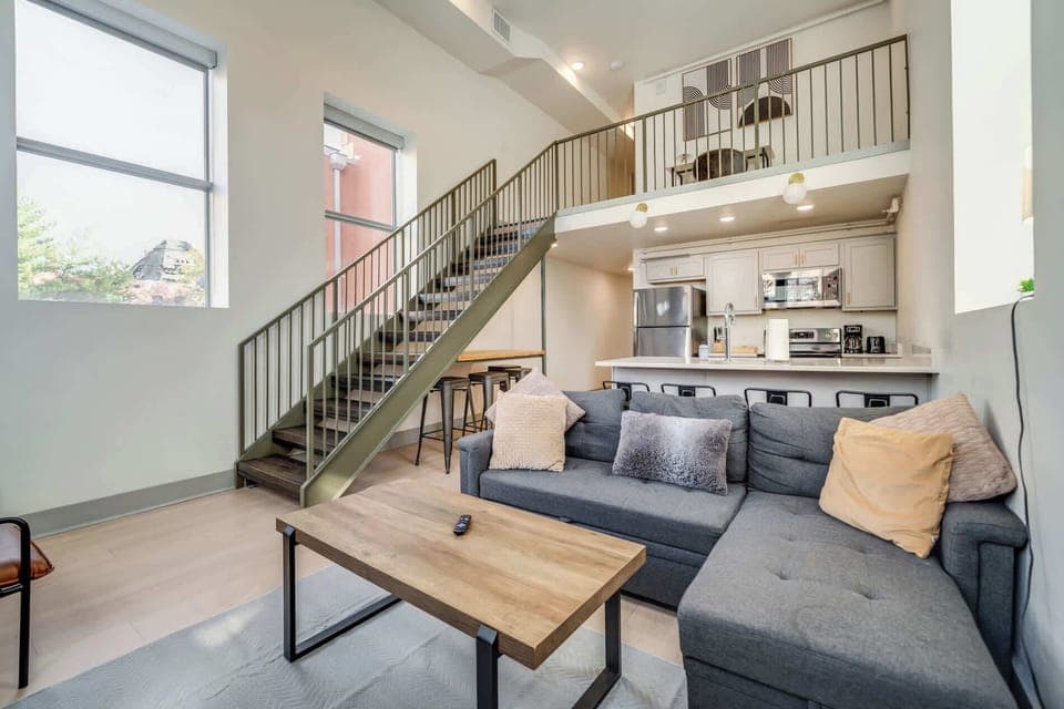 Make yourself at home in the cozy living room with a comfy sofa and TV to unwind.