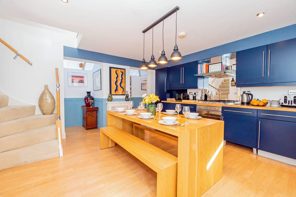 Dining Room: Gather around the stylish table for memorable meals and vibrant conversation!