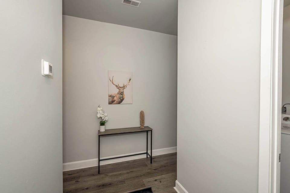 A tranquil entry way welcomes you to your Covington home away from home