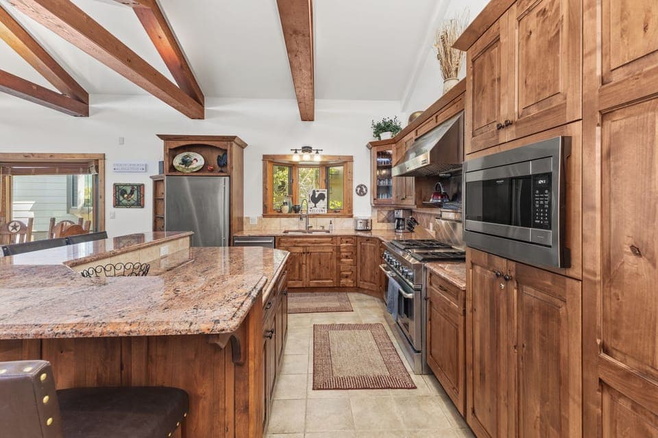 Top Level | Gourmet Kitchen | 2 Ovens, Flattop, 6 Burner Gas Stove