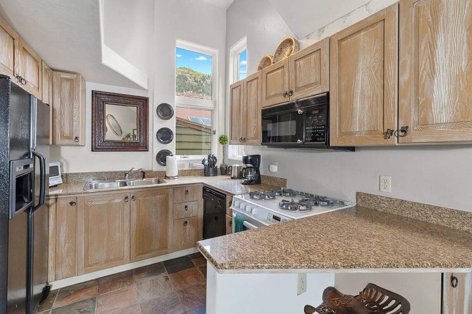 Kitchen With Vaulted Ceiling and Great Views Too
