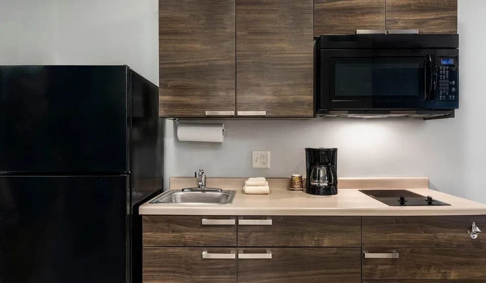 Prepare simple meals with microwave, cooktop, and handy counter space.