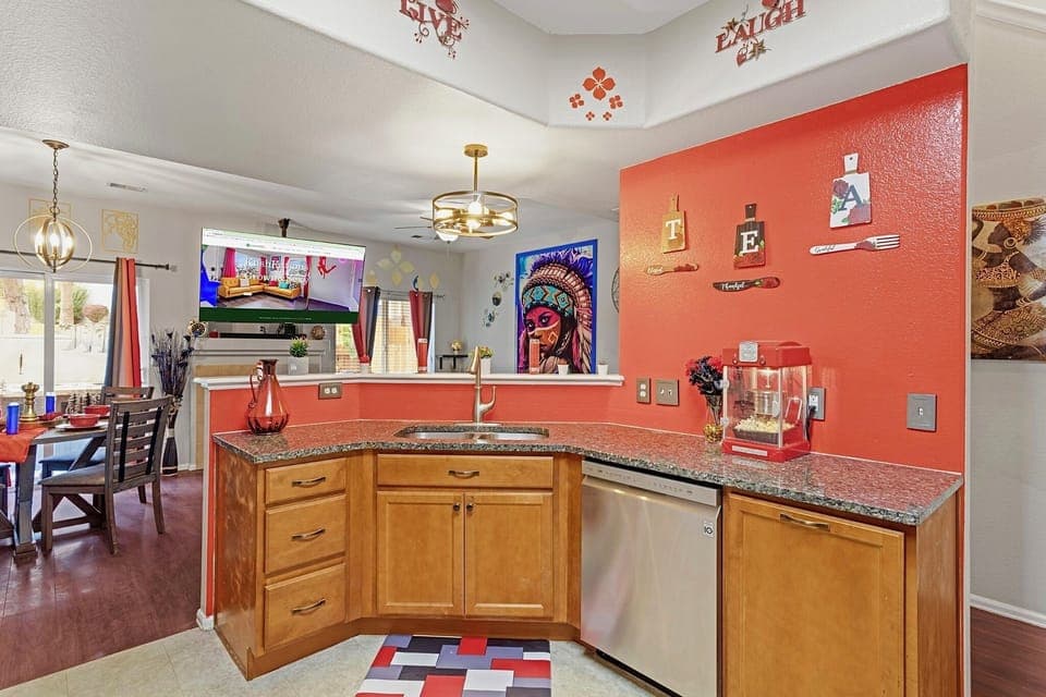 Spacious and well-equipped kitchen with modern appliances and plenty of counter space. Perfect for cooking up a feast or enjoying a quick meal.