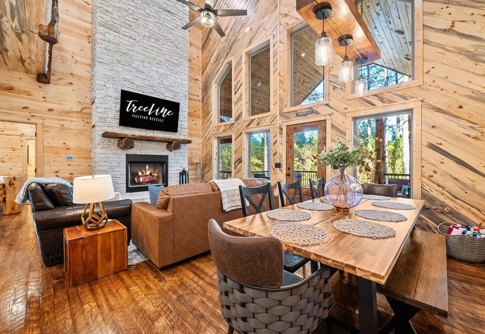 Comfortable seating, a cozy fireplace, and plenty of space to relax — this living room is perfect for family hangouts.