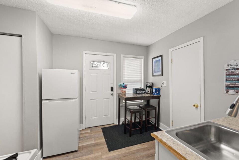 Simple elegance meets functionality in this charming kitchenette.  A place to create lasting memories.