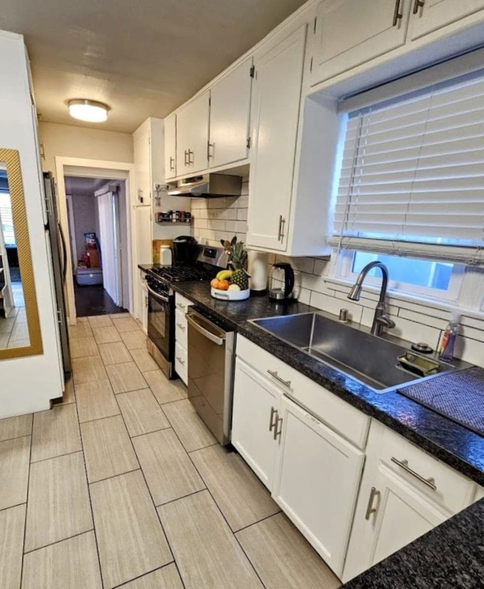 Large kitchen with amenities.
