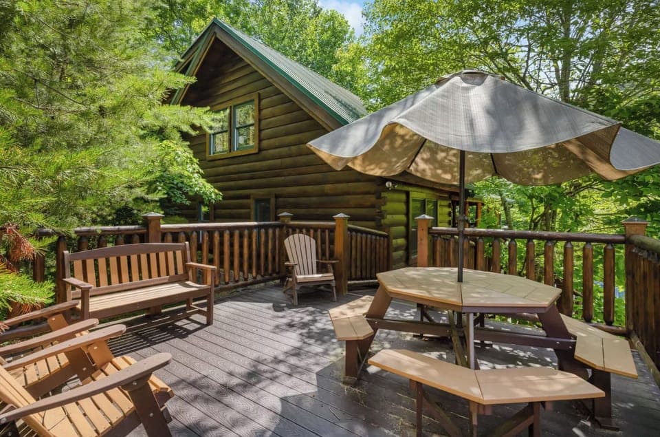 Fire pit and outdoor dining amidst the pine trees