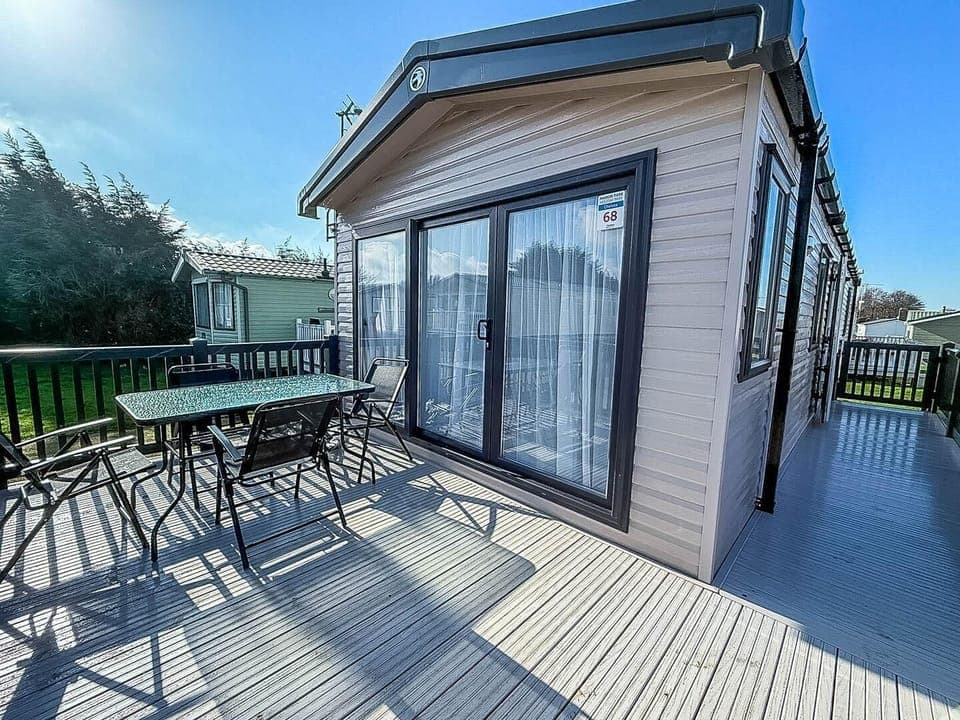 Elevate your next UK holiday by choosing this lovely 6 berth caravan with decking located on Manor Park Holiday Park in Hunstanton, Norfolk.