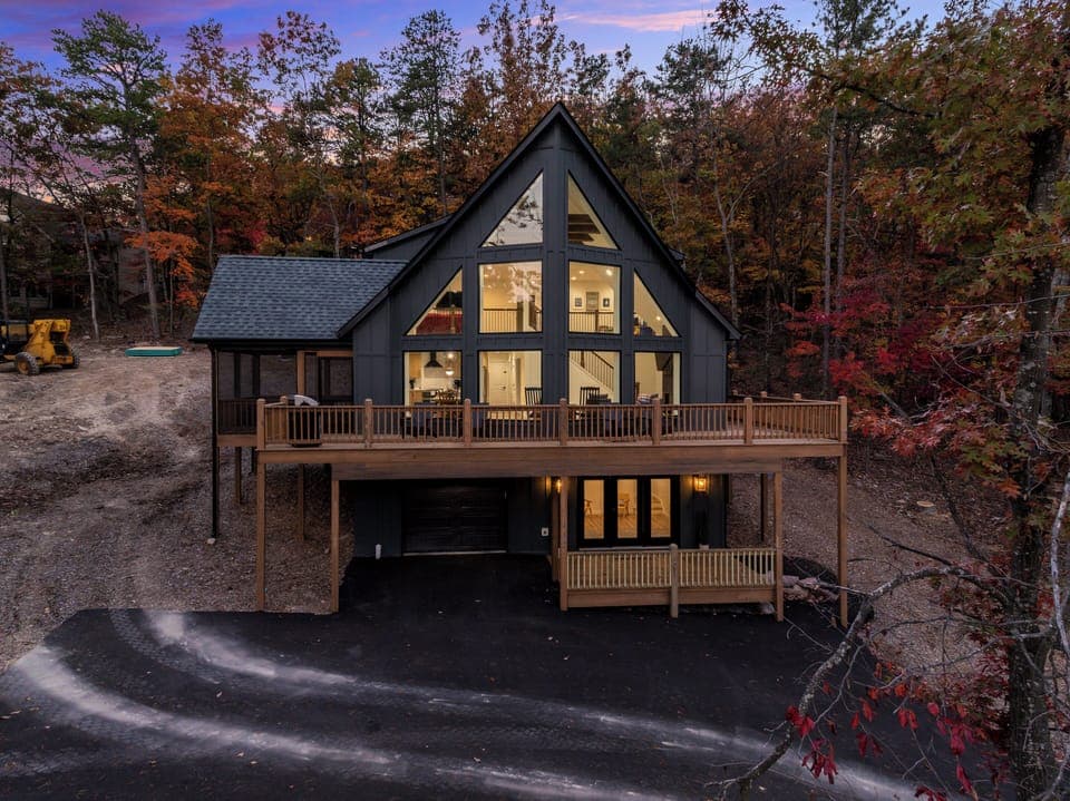 Escape to this like-new stunning 5-bedroom A-frame home nestled in the heart of Massanutten Resort. Designed for both relaxation and adventure, this modern mountain boasts panoramic views, soaring ceilings, and open-concept layout perfect for gatherings.