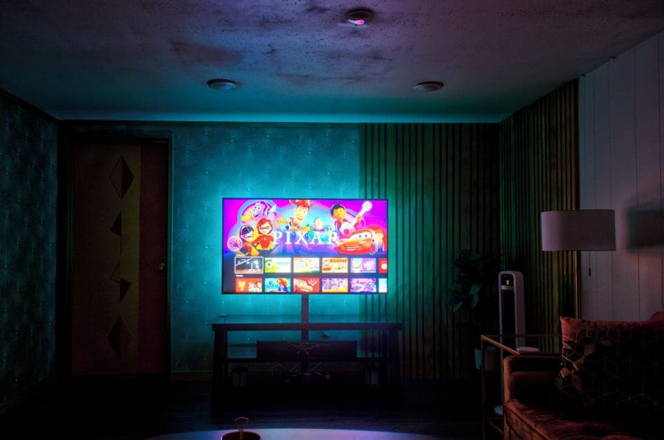 Customizable backlighting on the TV wall.