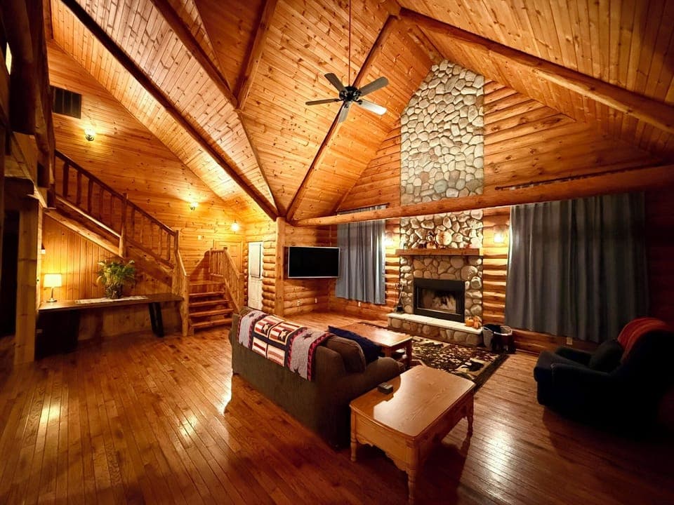 Living Room w Lofted Wood Beam Ceilings