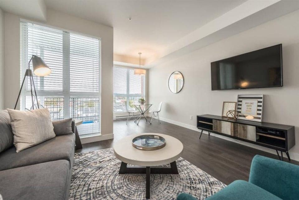 Bright living room with city views and modern comfort