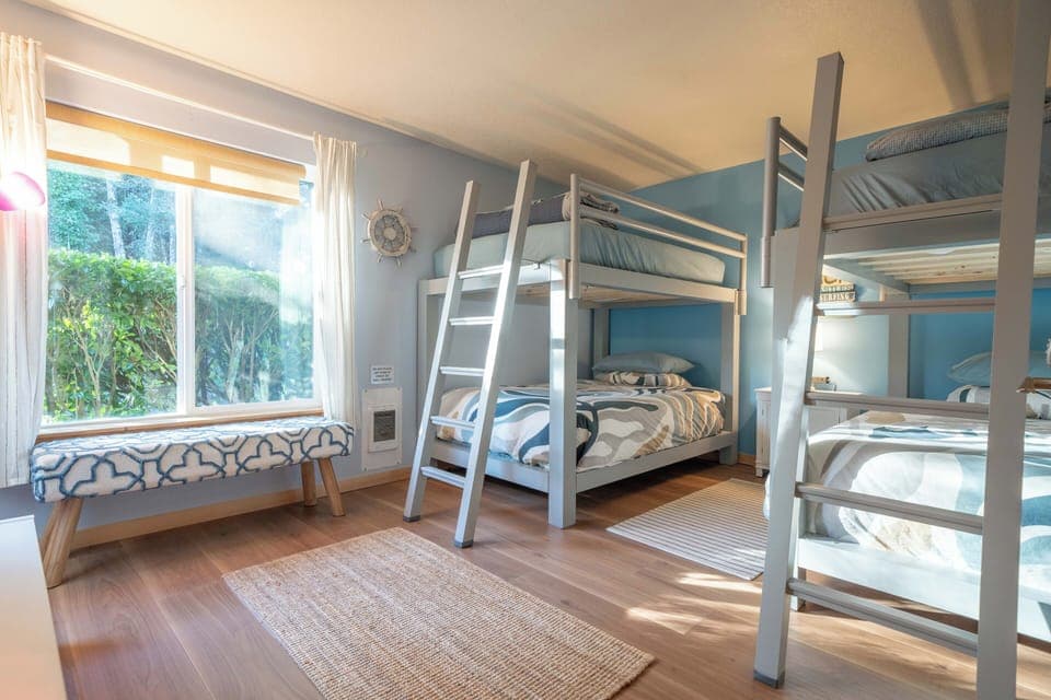 Two adult strength custom bunk beds complete with 4x full mattresses.  