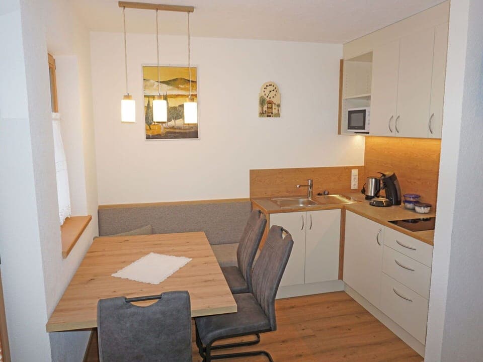 Furniture, Property, Table, Cabinetry, Building, Picture Frame, Wood, Interior Design, Chair, Countertop