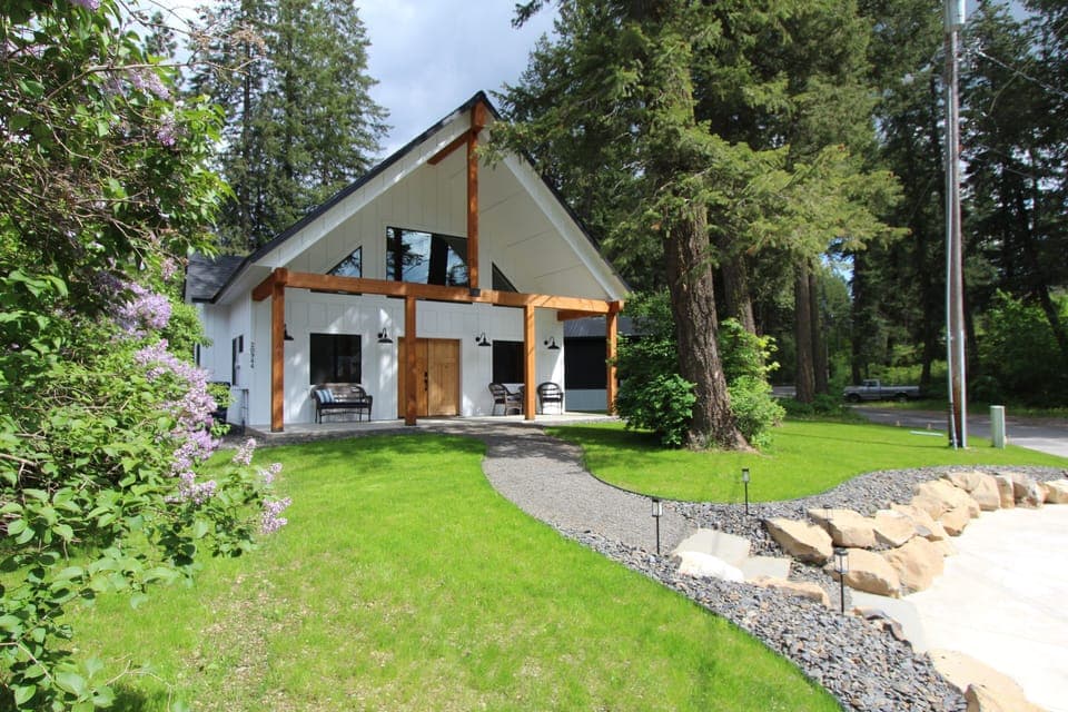 Cozy farm style home in the woods.  Covered front porch with views of the lake!