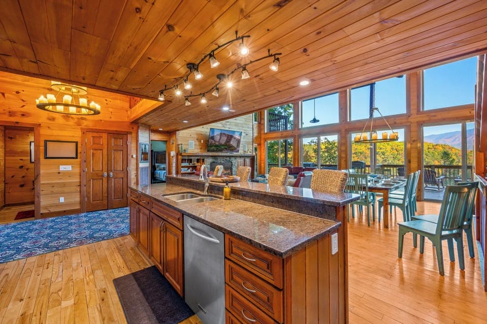 With our fully loaded kitchen boasting amazing views of the Smokies, you might even fight over who gets to prepare meals!