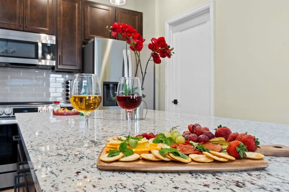 Enjoy lively conversations around the kitchen island, where great food and good company come together