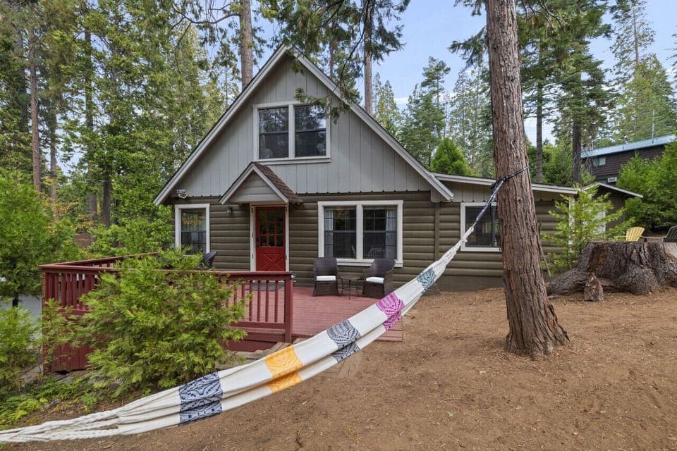 Escape to tranquility. Your cabin in the woods awaits