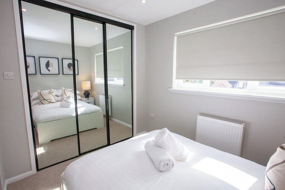 Bedroom with built-in wardrobes