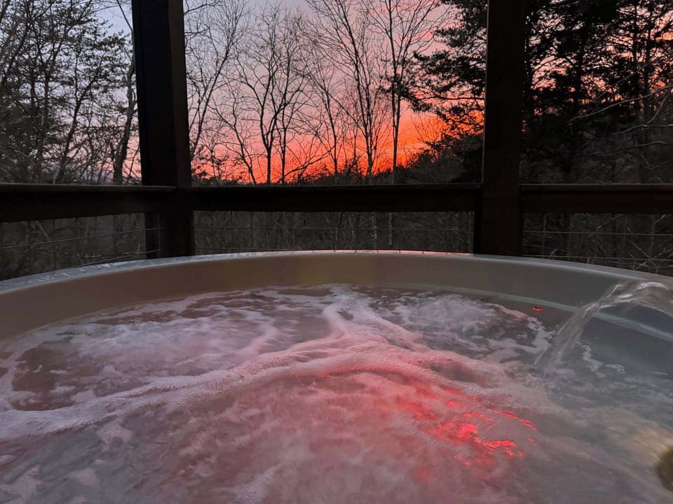 Lower level outdoor 6 person hot tub with outdoor TV 
