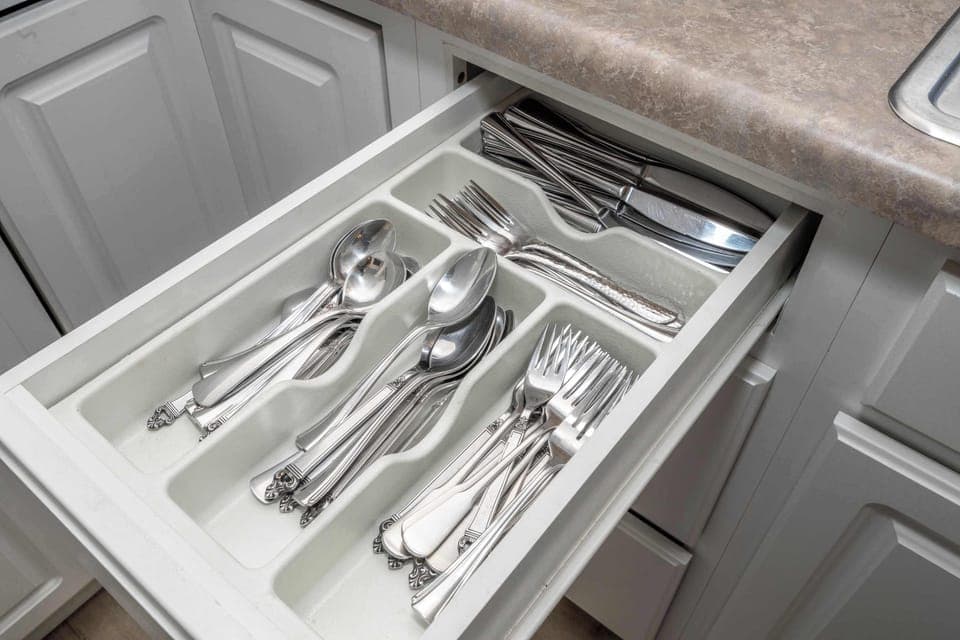 The kitchen is stocked with ample amenities for an unforgettable getaway