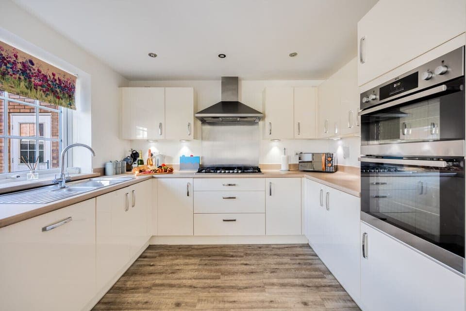 A fully equipped kitchen with everything you need to prepare a home cooked meal