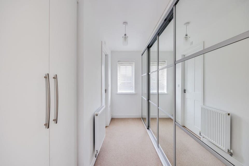 Bedroom 1: Walk-in wardrobe
